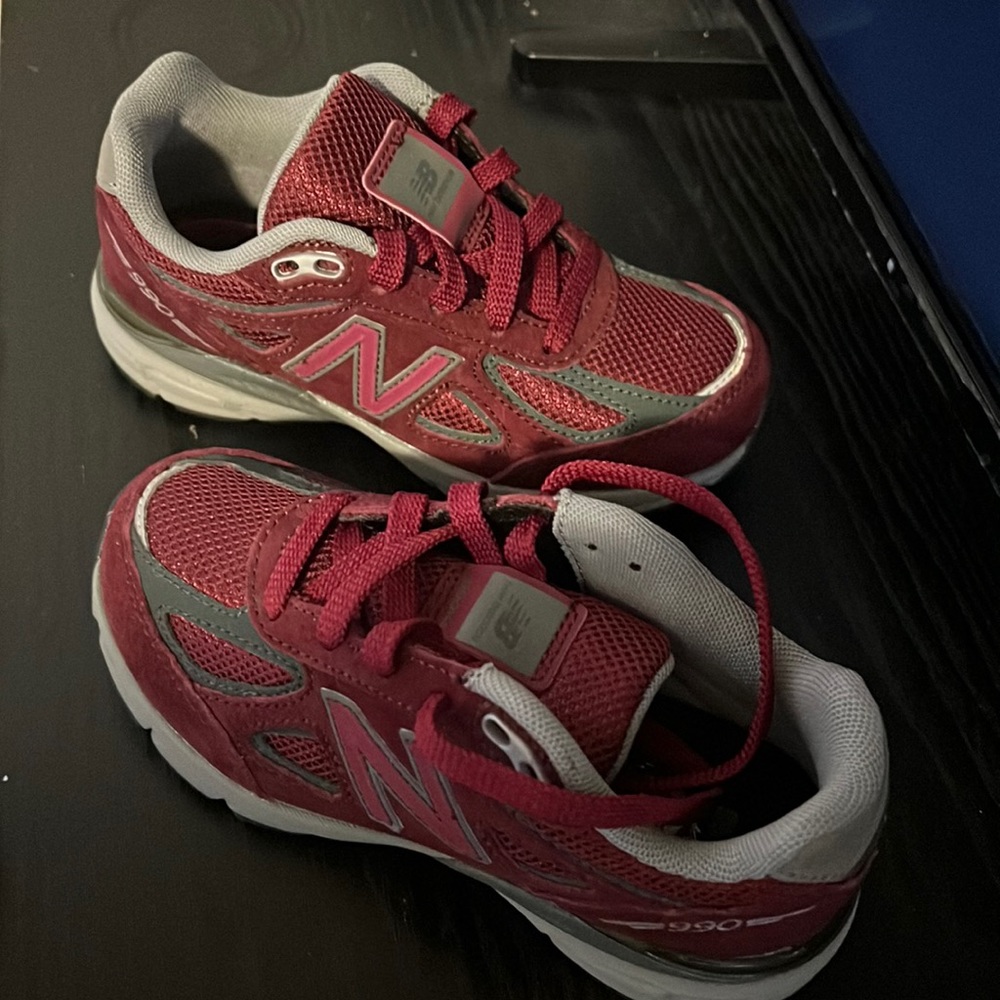 A pair of Brand New, New Balance toddler size 11.5. The sneakers are unisex.